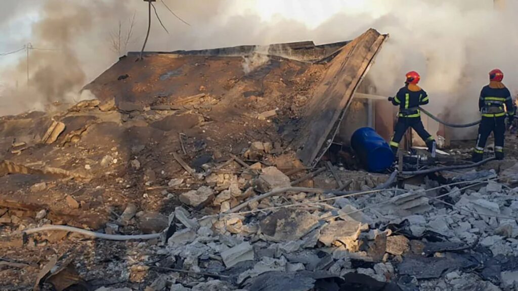 Emergency services respond to a fire caused by a Russian rocket attack in Lviv, Ukraine, on November 17.