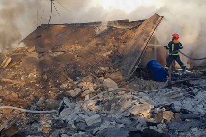 Emergency services respond to a fire caused by a Russian rocket attack in Lviv, Ukraine, on November 17.